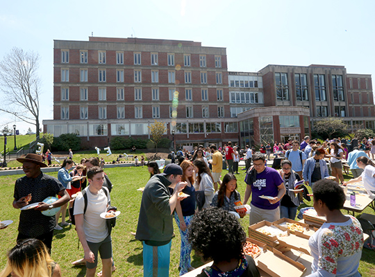 Students and staff taste food from local restaurants who offered samples on the Hoval.