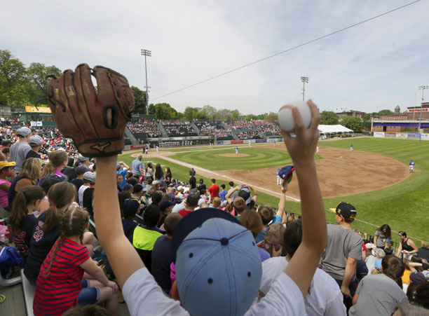 Kids cheer at Bravehearts baseball game on Fitton Field